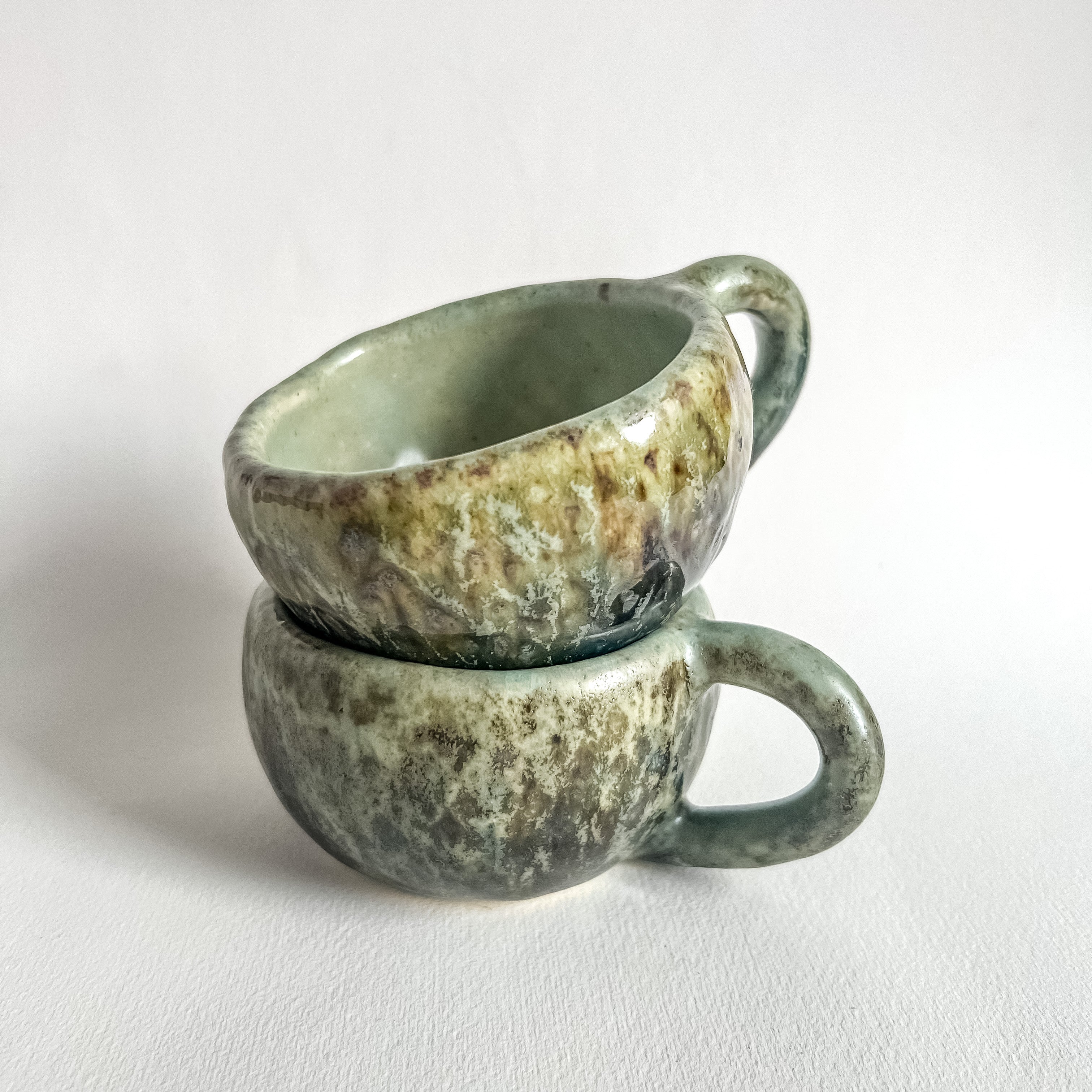 handmade green ceramic coffee mugs from Mexico