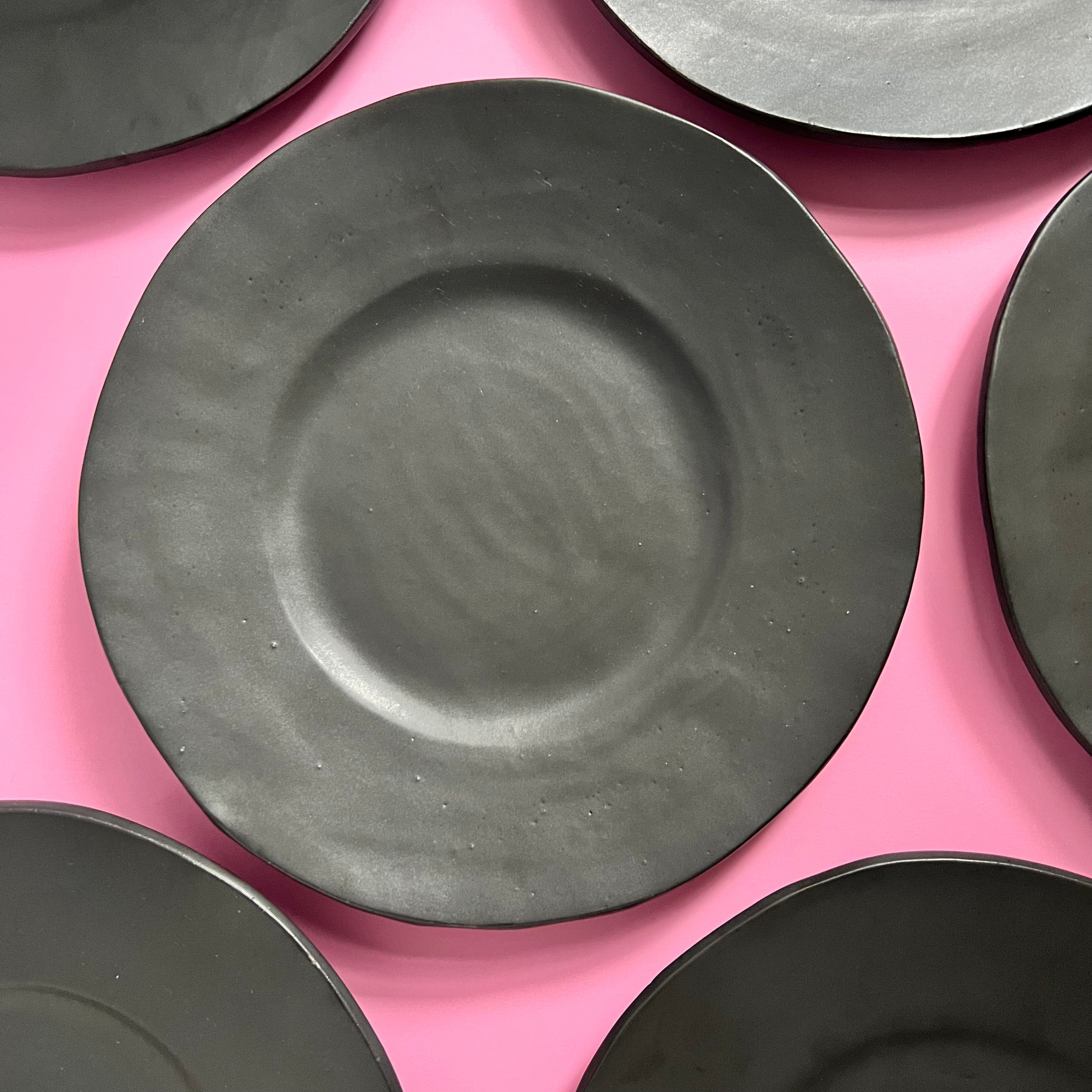 black matte dinner plates with Barbie pink handmade in Chile