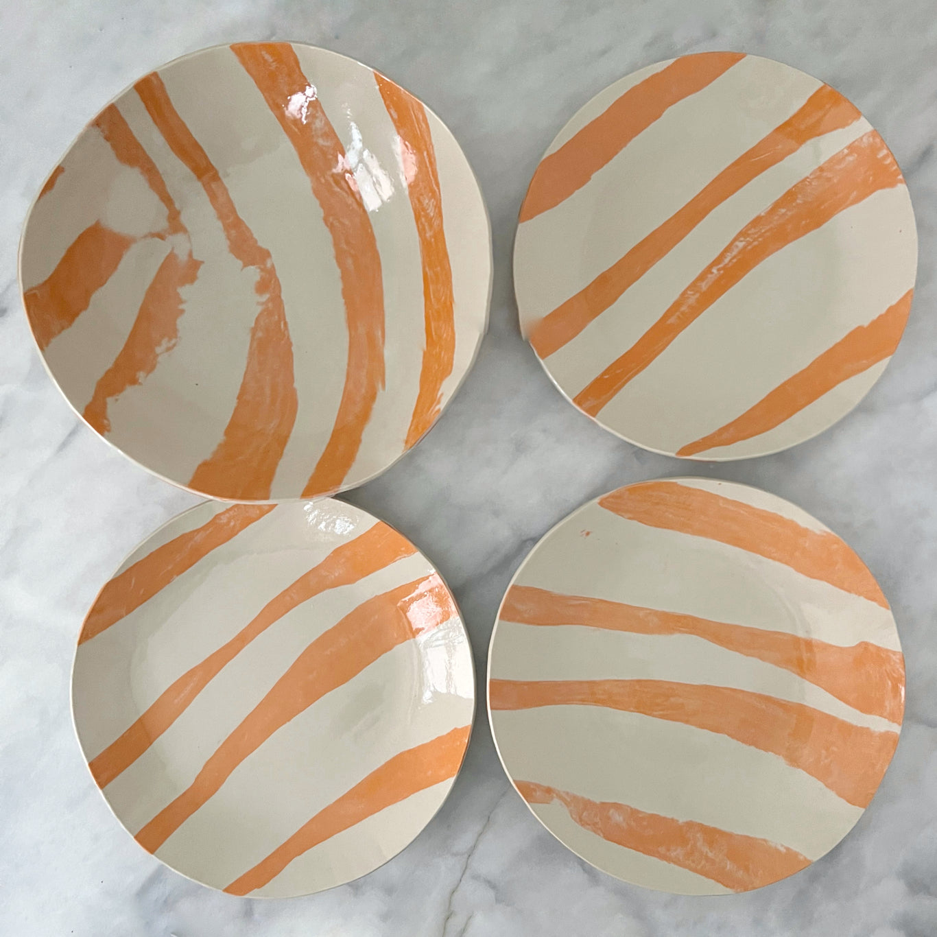 Handmade ceramic orange and off white salad bowl and plate set