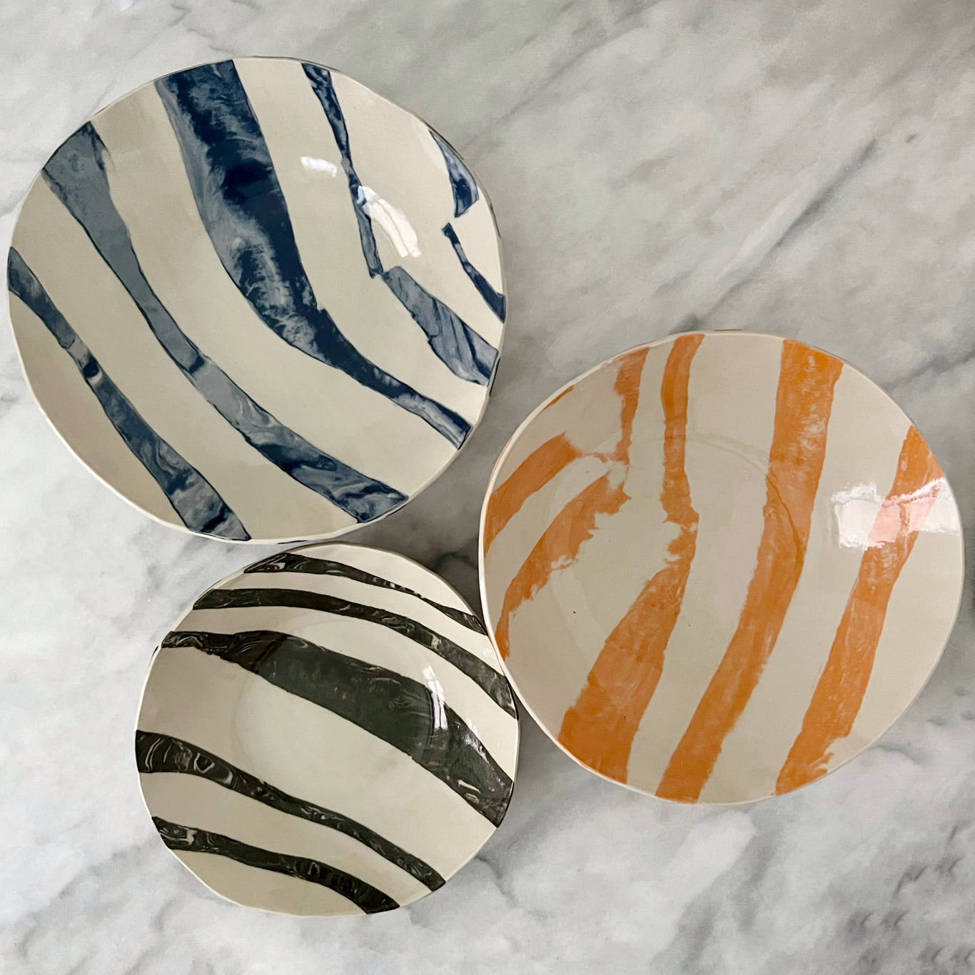 Ceramic handmade salad bowls in orange blue and anthracite